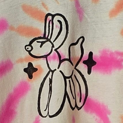 Black balloon animal design on a tie-dye background with pink and orange hues.