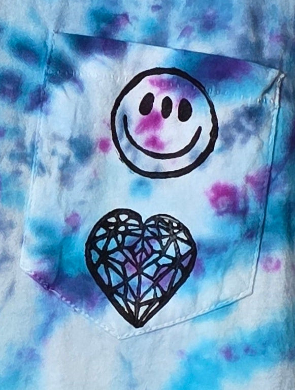 Tie-dye tank top with a heart and smiley face design.