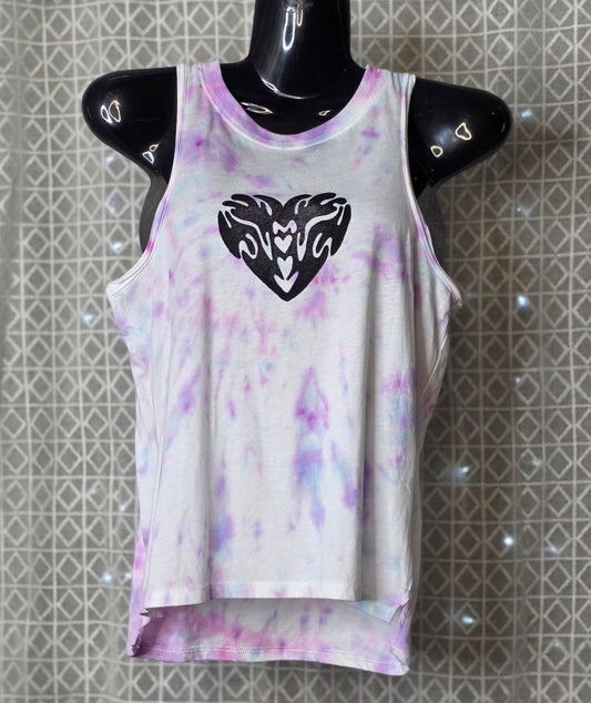 Tie-dye tank top with a black heart logo on a mannequin against a patterned background