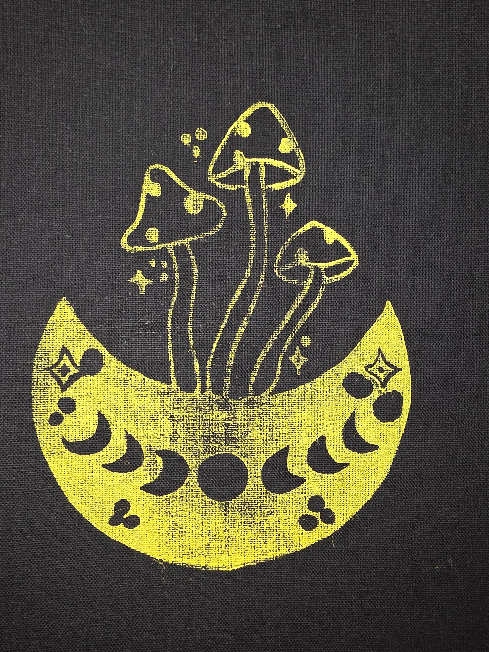 Yellow crescent moon with star and moon phases on a black background